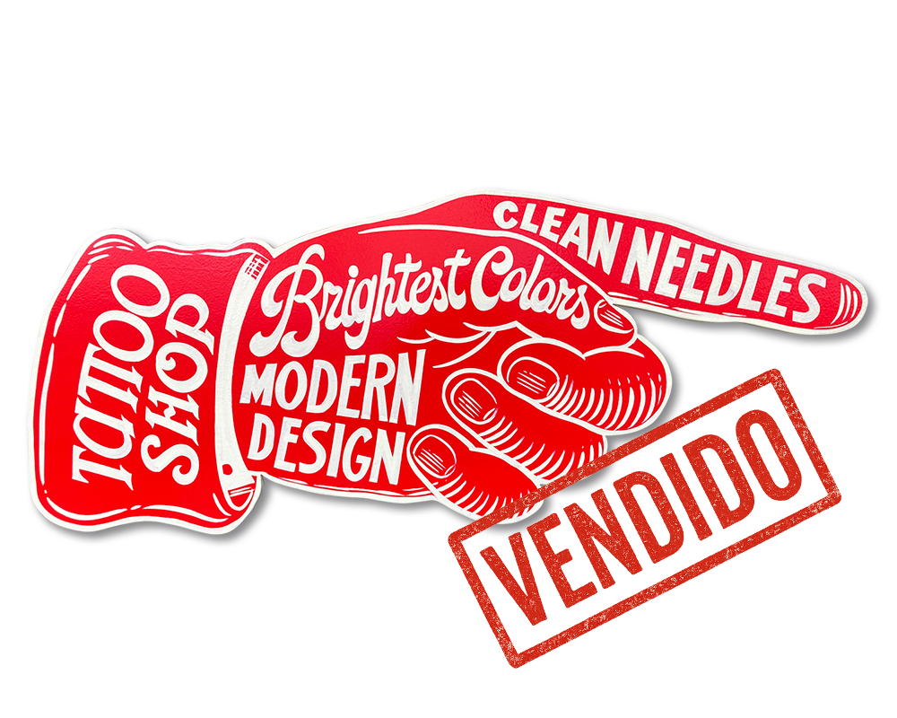 Letrero tattoo mano señalando vendido
